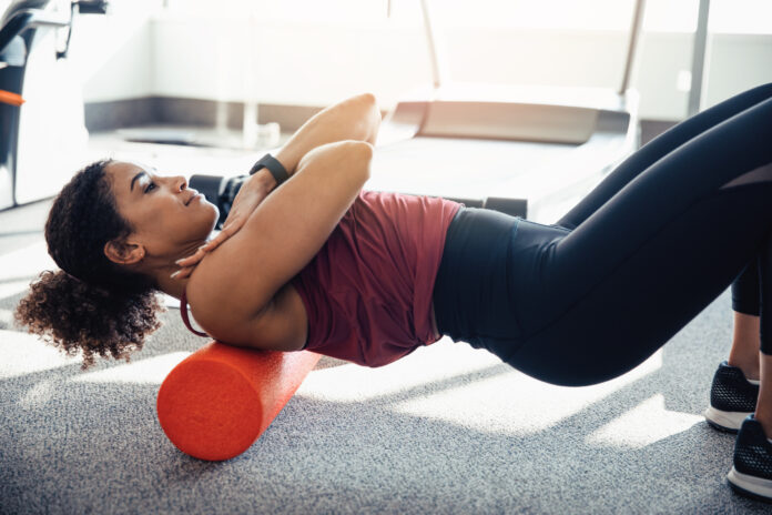 Stretching Her Upper Back