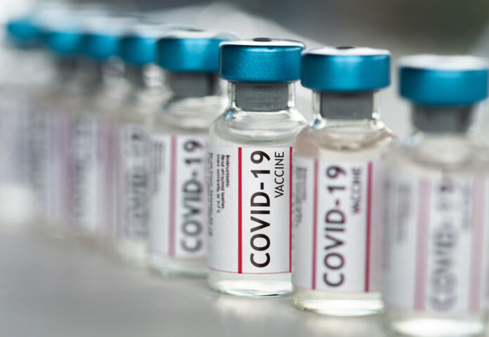 Covid-19 Coronavirus Vaccine vials in a row macro close up